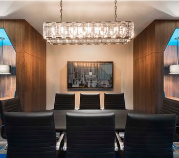 Business center with private and collaborative work spaces